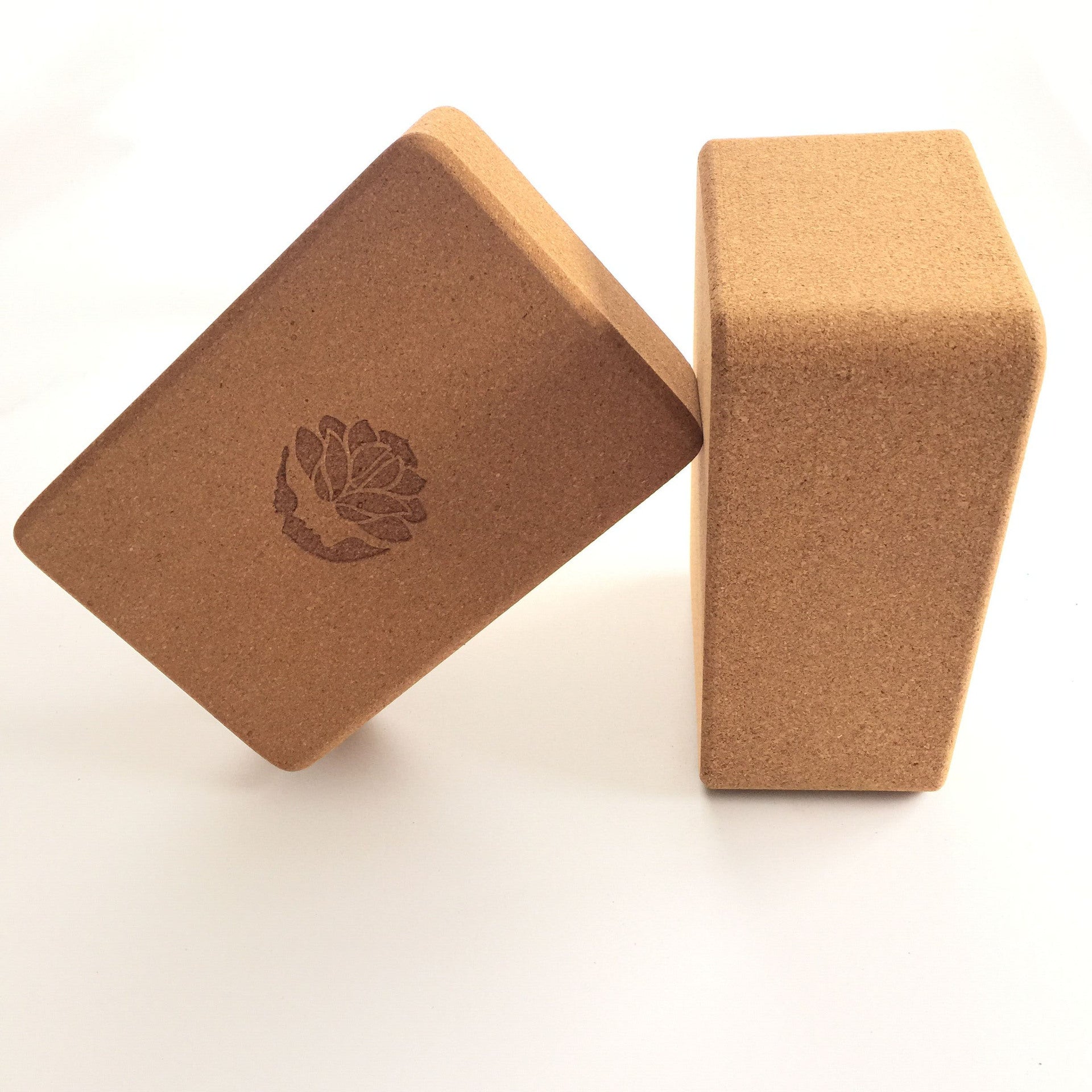 Cork yoga block in use during yoga session